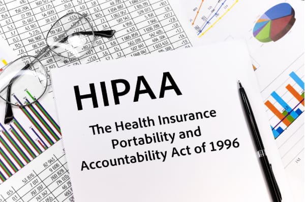 HIPAA compliance document with charts highlighting healthcare data security requirements