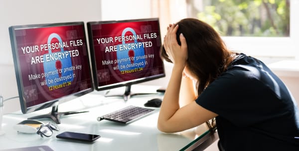 Ransomware attack encrypting personal files—major cyber threat for RIA firms